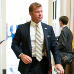 Tim Sheehy hearing incident showing senator and Capitol Police removing Brian McGinnis from Senate Armed Services subcommittee hearing