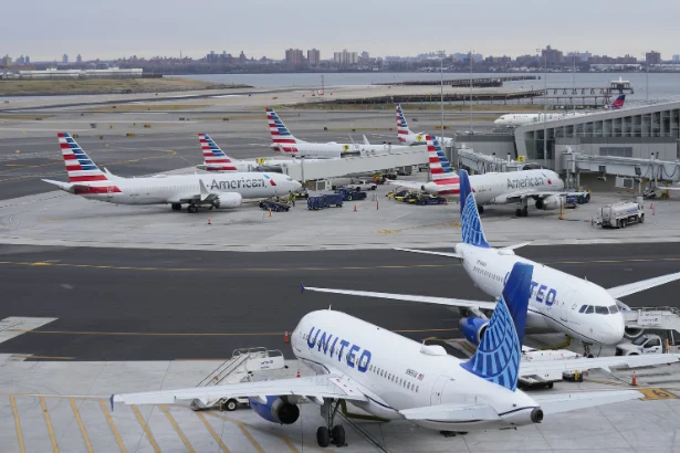 US airports flight disruptions 2026 crowded terminal passengers stranded