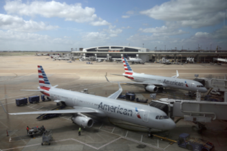 DFW ground stop flights canceled 2026 American Airlines thunderstorms Dallas Fort Worth