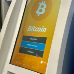 Bitcoin ATM scam machine inside gas station used by fraudsters