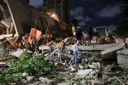 Venezuela earthquake 2026 collapsed building Caracas rescue workers