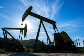 Oil prices Iran deal 2026 WTI below $80 Brent $83 Strait of Hormuz reopen June 15