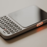 Clicks Communicator Phone 2026 physical QWERTY keyboard BlackBerry design hands-on