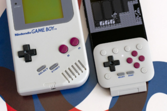 8BitDo FlipPad controller attached to smartphone
