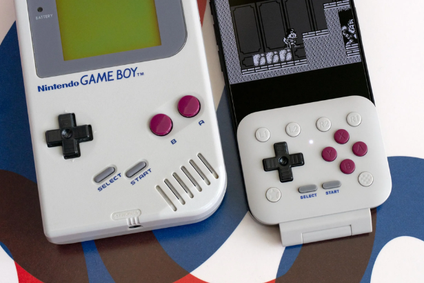 8BitDo FlipPad controller attached to smartphone