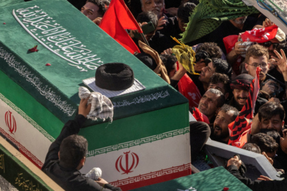 Iran war Khamenei burial 2026 Mashhad mourners Shrine Imam Reza funeral procession