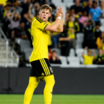 América players celebrate after beating Columbus Crew 2-0