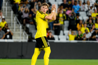 América players celebrate after beating Columbus Crew 2-0