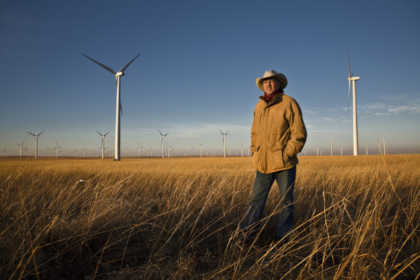 Pete Ferrell Kansas wind ranch with wind turbines across the Flint Hills