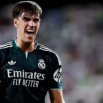 Elche vs Real Madrid match showing Carlos Espí celebrating his late winning goal for Real Madrid.
