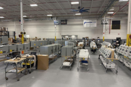AI infrastructure manufacturing in the United States with industrial equipment and data center power systems