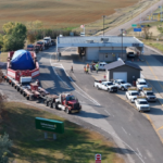 US project logistics heavy-haul truck carrying oversized industrial equipment