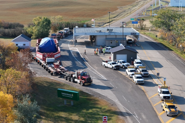 US project logistics heavy-haul truck carrying oversized industrial equipment