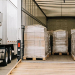 US LTL freight rates and palletized goods inside a semi-truck trailer