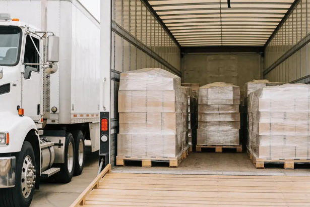 US LTL freight rates and palletized goods inside a semi-truck trailer